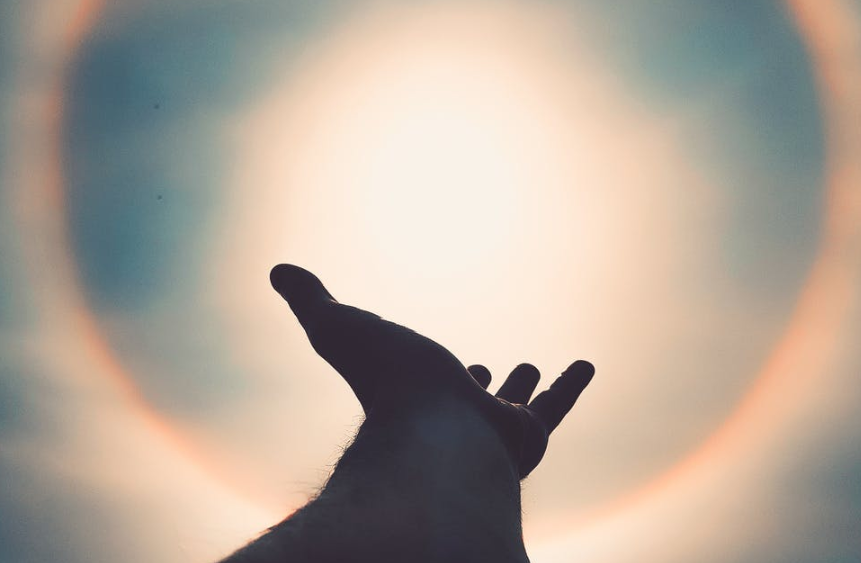hand reaching into the sky